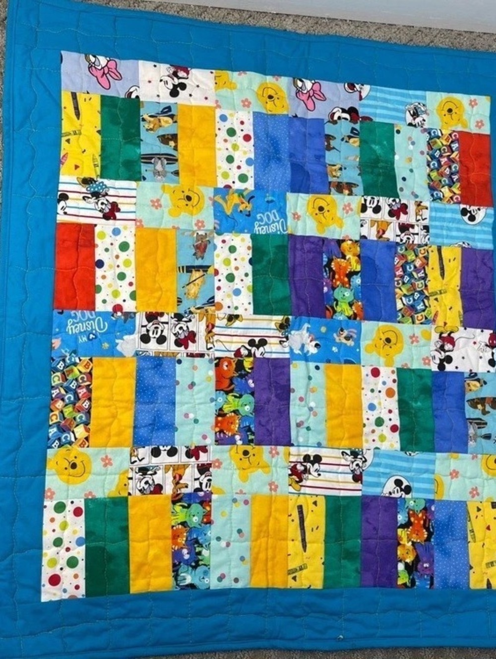 Handmade Patchwork Baby Quilt Disney theme and rainbows. Blue & Multicolor